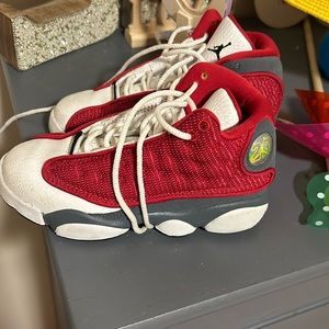 Red, white and gray Jordans. Kids size 10.